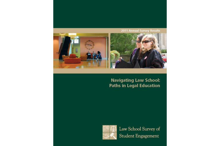 A dark green book cover titled, "Navigating Law School: Paths in Legal Education." The top of the cover is a landscape-oriented photo collage of two images, one on the left and one on the right. The image on the left shows the interior of a law school lobby, with a large clock on the wall and two students studying on couches. The image on the right shows two law students, a woman and a man, smiling outside in graduation gowns and sunglasses. At the bottom of the cover is the "Law School Survey of Student Engagement" logo.